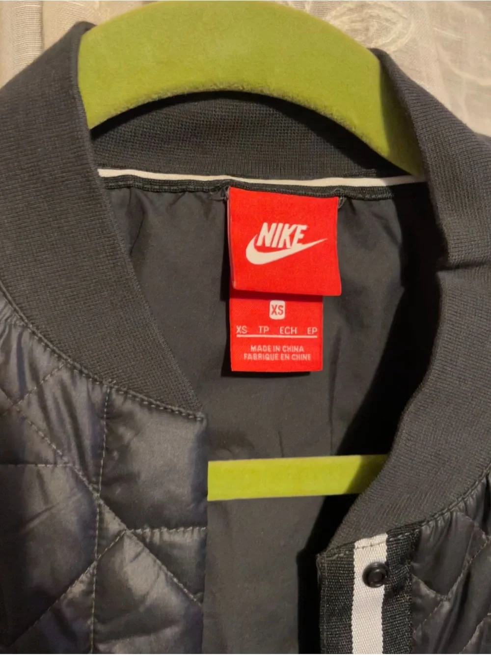 Nike Women’s Black Quilted Bomber Jacket with Contrast Trim